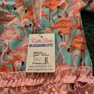 Ruffle Butts Swimsuit NWT Size 3-6 months . Paid 26.50 … Selling for 15.00